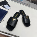 PRADA SAFFIANO PATENT SLIDES OSTRICH MOTIF BLACK CALFSKIN