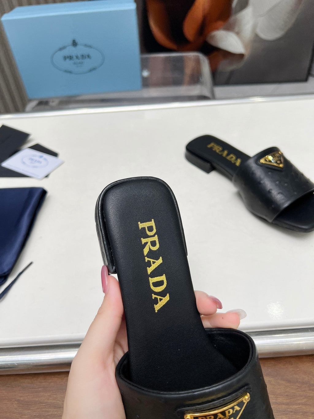 PRADA SAFFIANO PATENT SLIDES OSTRICH MOTIF BLACK CALFSKIN