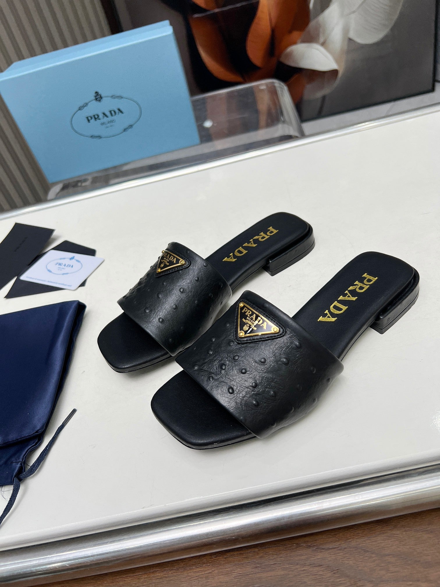 PRADA SAFFIANO PATENT SLIDES OSTRICH MOTIF BLACK CALFSKIN