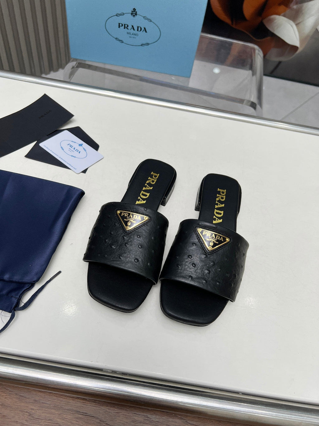 PRADA SAFFIANO PATENT SLIDES OSTRICH MOTIF BLACK CALFSKIN