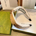 GUCCI HAIRBAND WITH FLOWER PRINT IN DESERT BROWN SILK 398864
