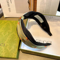 GUCCI HAIRBAND WITH FLOWER PRINT IN MOSS GREEN SILK 398865