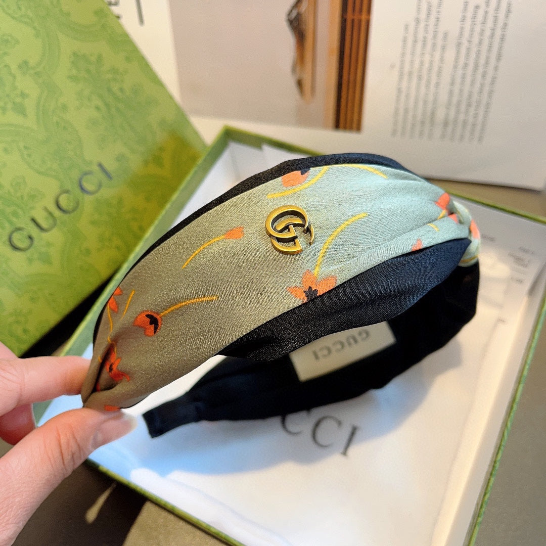 GUCCI HAIRBAND WITH FLOWER PRINT IN MOSS GREEN SILK 398865