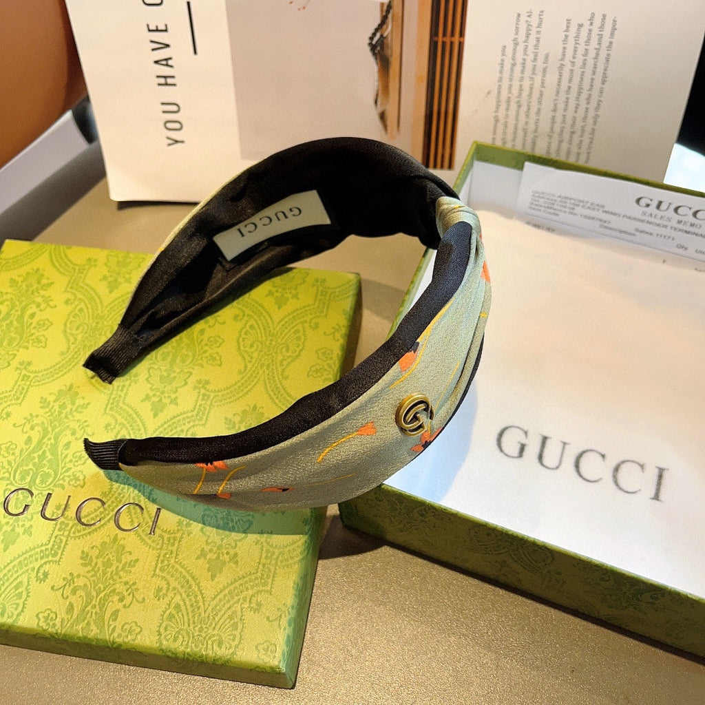 GUCCI HAIRBAND WITH FLOWER PRINT IN MOSS GREEN SILK 398865