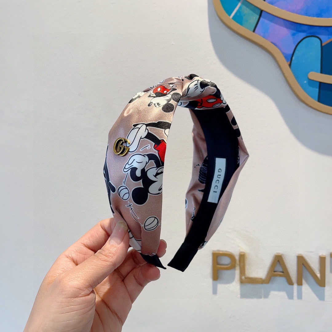 GUCCI MICKEY PRINT HAIRBAND IN LIGHT PINK SILK 409359