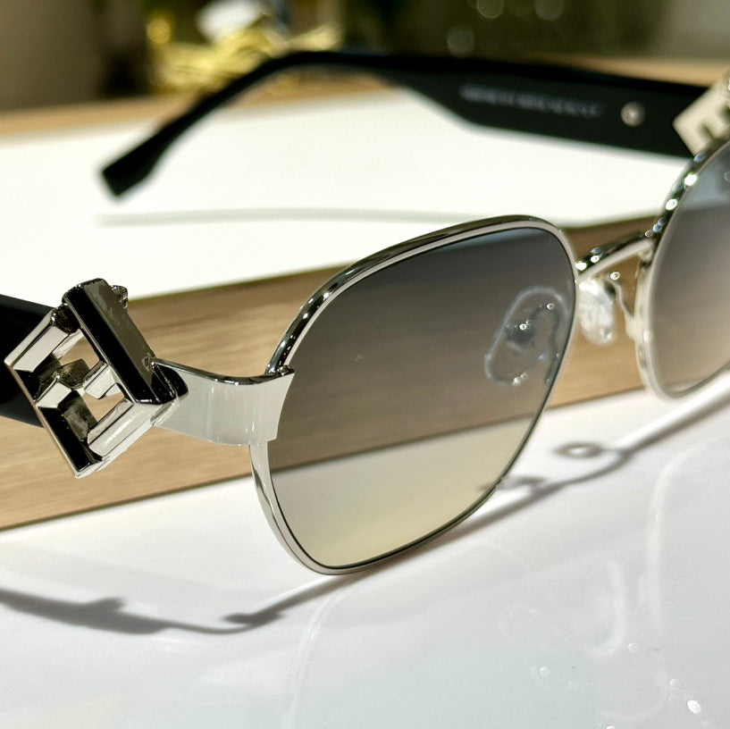 TRAVEL ROUND FRAME SUNGLASSES FE40148l IN METAL AND ACETATE