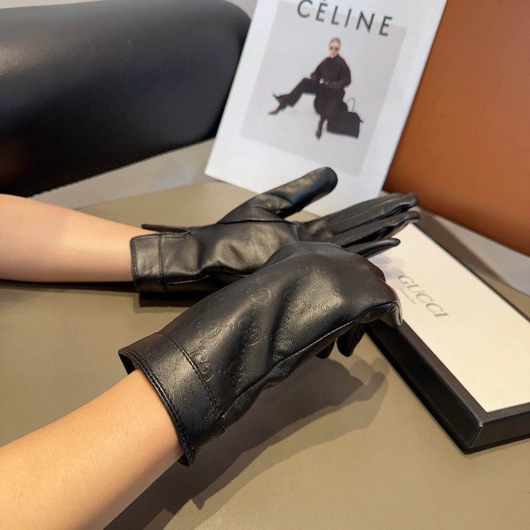 GUCCI GLOVES IN BLACK EMBOSSED LAMBSKIN 423484