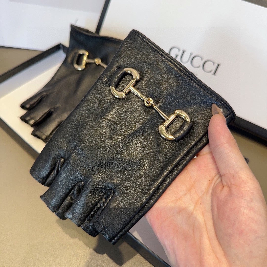 GUCCI FINGERLESS GLOVES IN BLACK LAMBSKIN 436035
