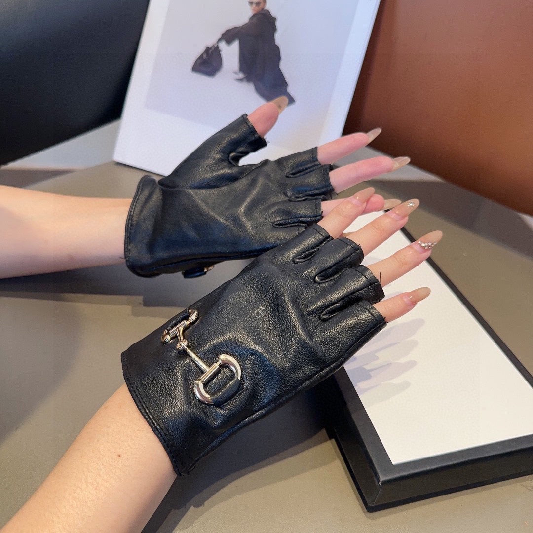 GUCCI FINGERLESS GLOVES IN BLACK LAMBSKIN 436035