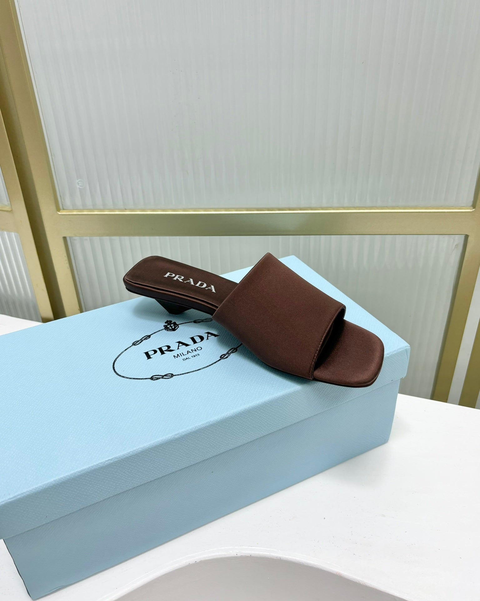 PRADA TRIANGLE HEEL SATIN SLIPPERS BROWN