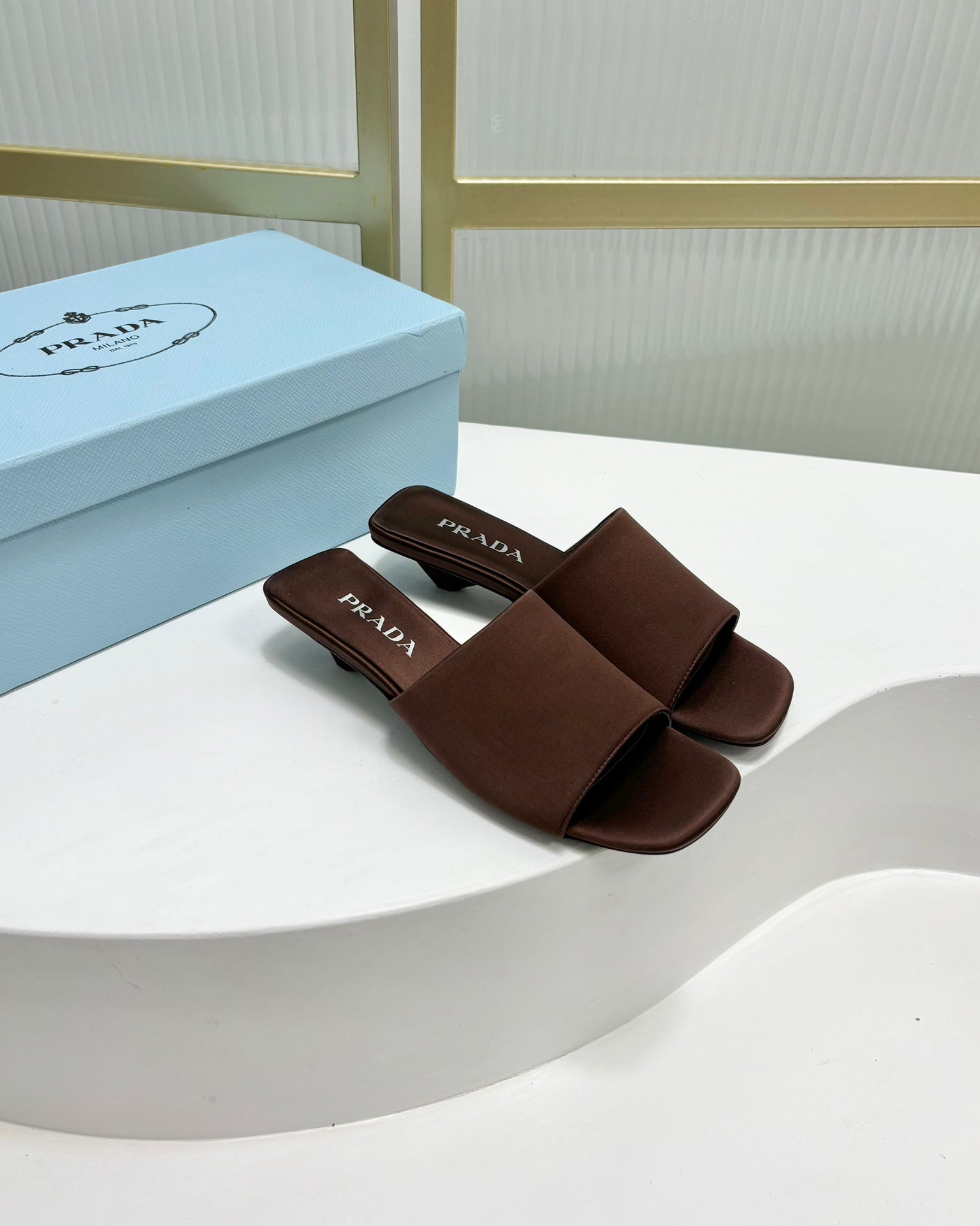PRADA TRIANGLE HEEL SATIN SLIPPERS BROWN