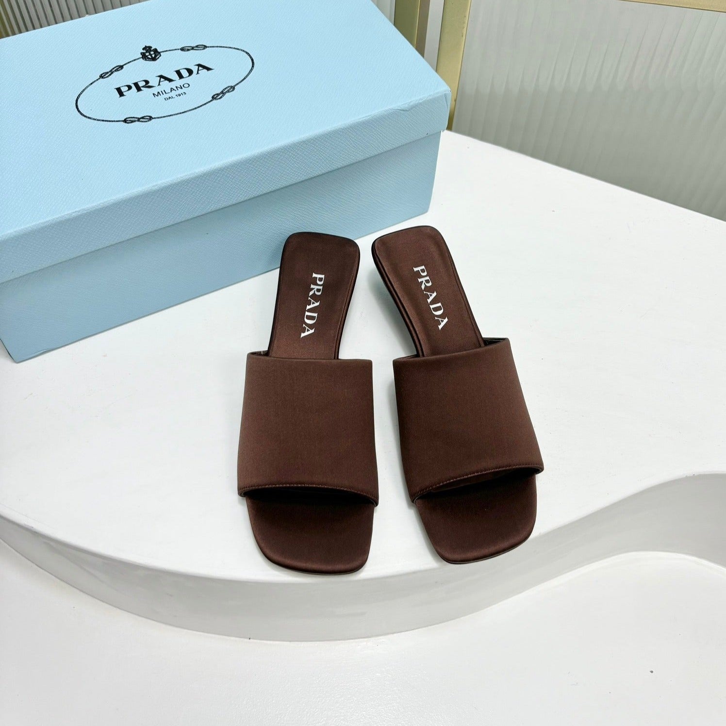 PRADA TRIANGLE HEEL SATIN SLIPPERS BROWN
