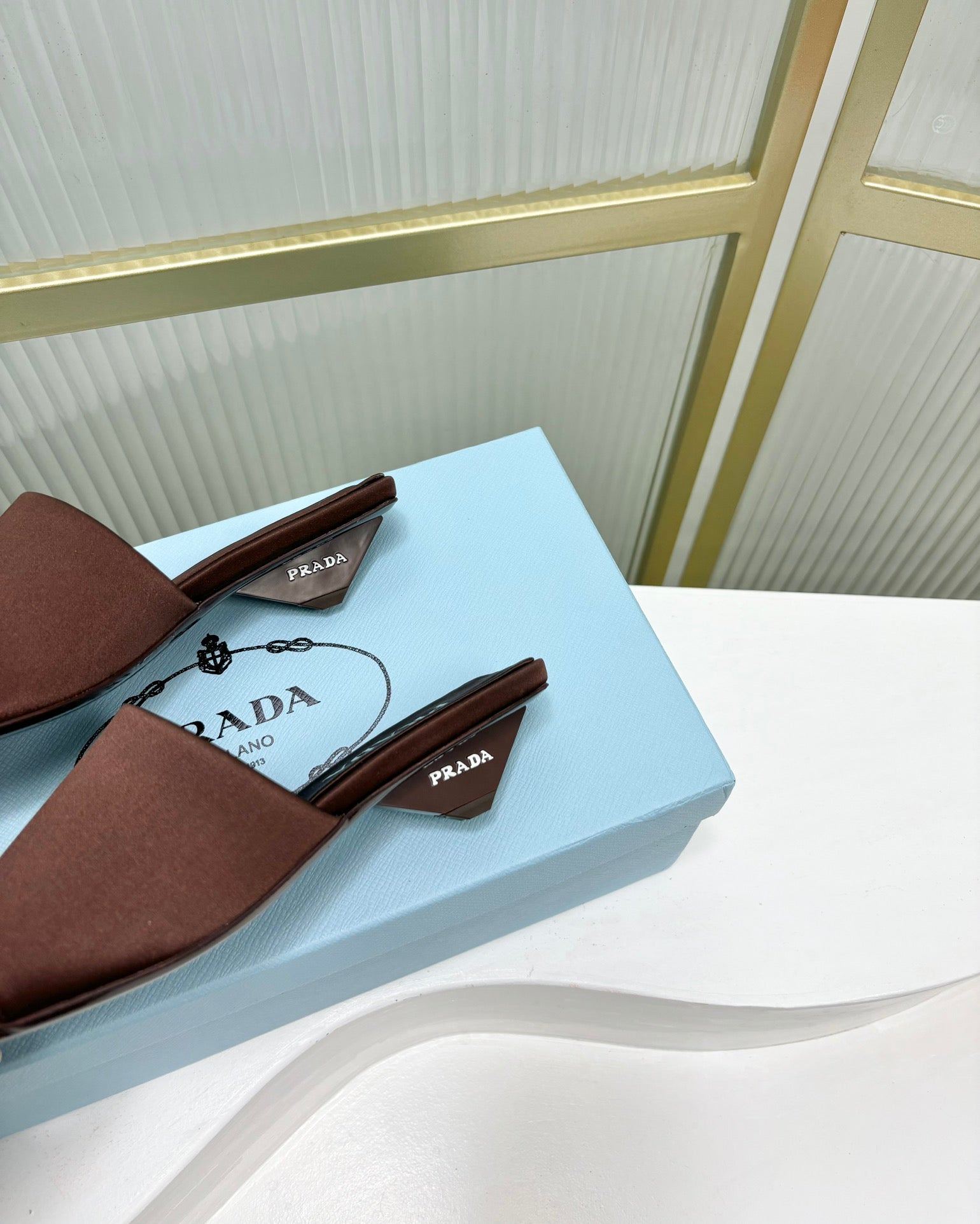 PRADA TRIANGLE HEEL SATIN SLIPPERS BROWN