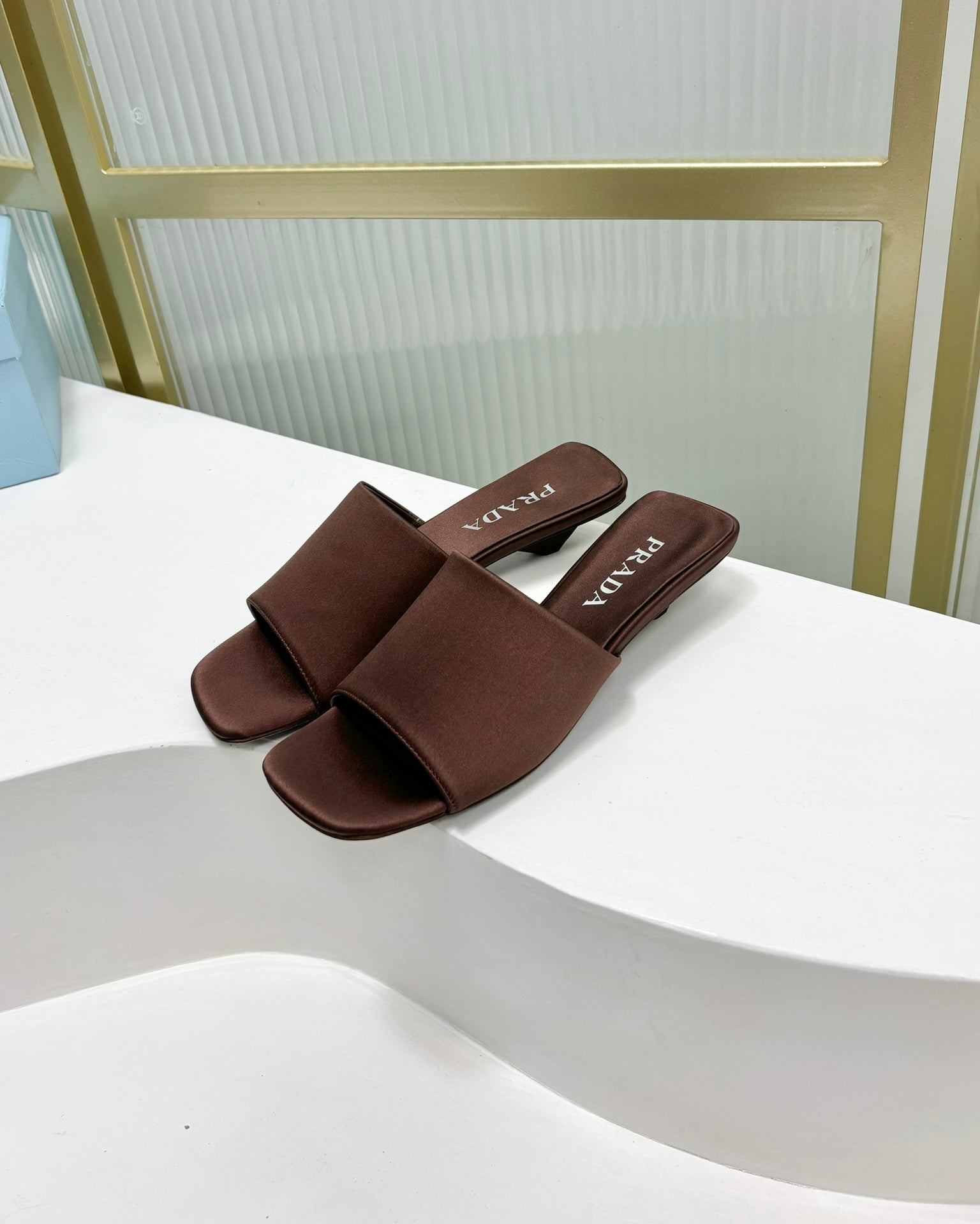 PRADA TRIANGLE HEEL SATIN SLIPPERS BROWN