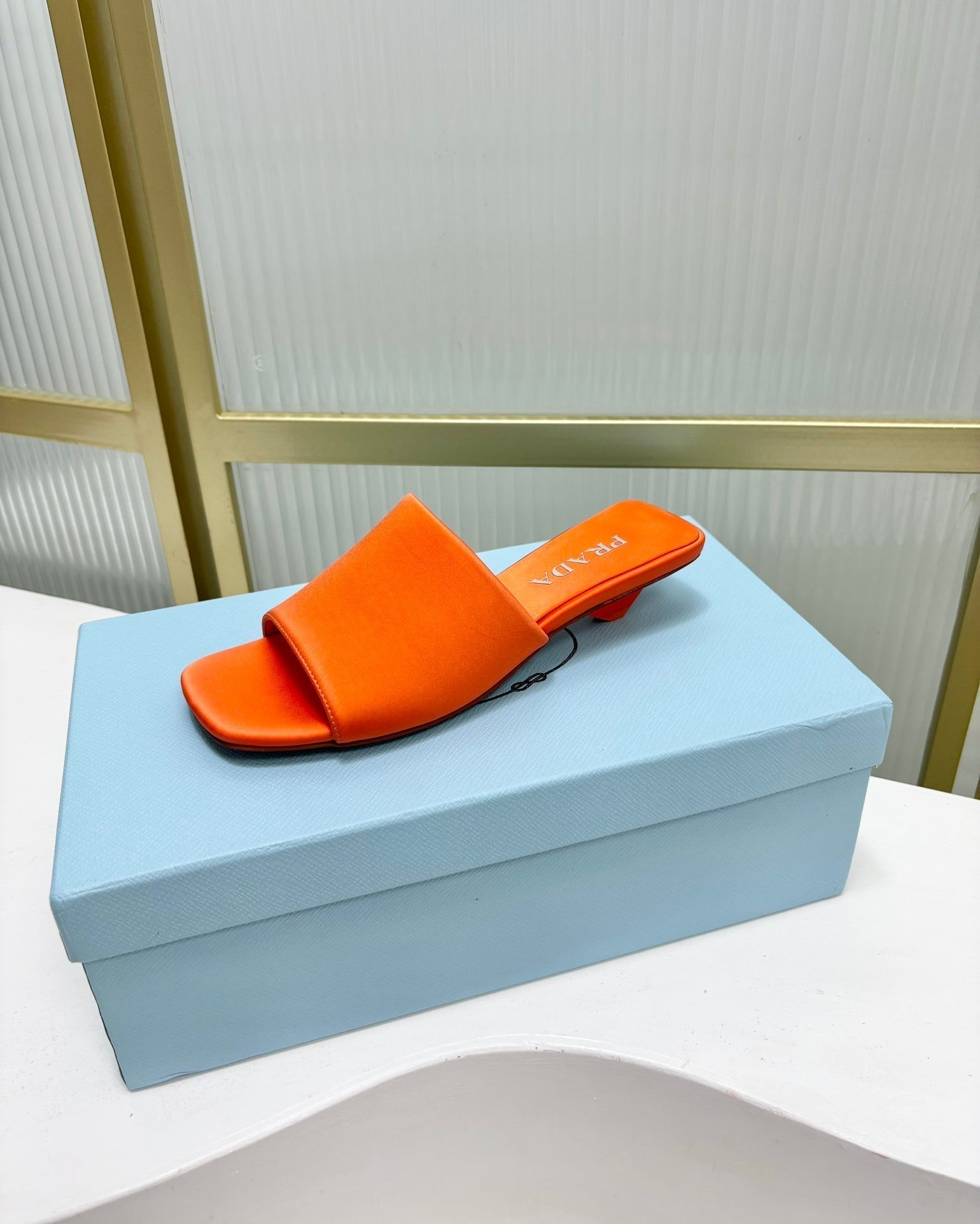 PRADA TRIANGLE HEEL SATIN SLIPPERS BRIGHT ORANGE