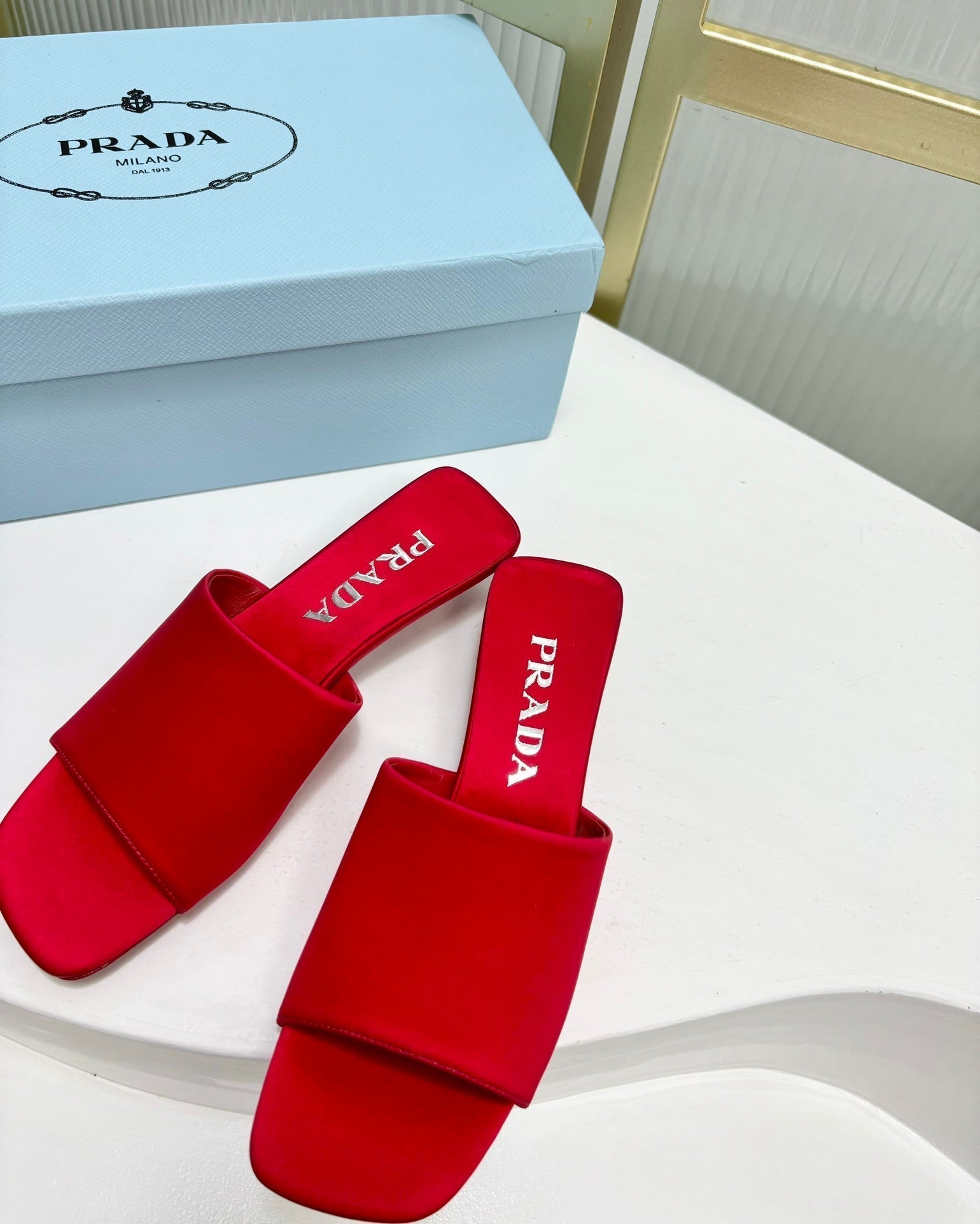 PRADA TRIANGLE HEEL SATIN SLIPPERS CRIMSON