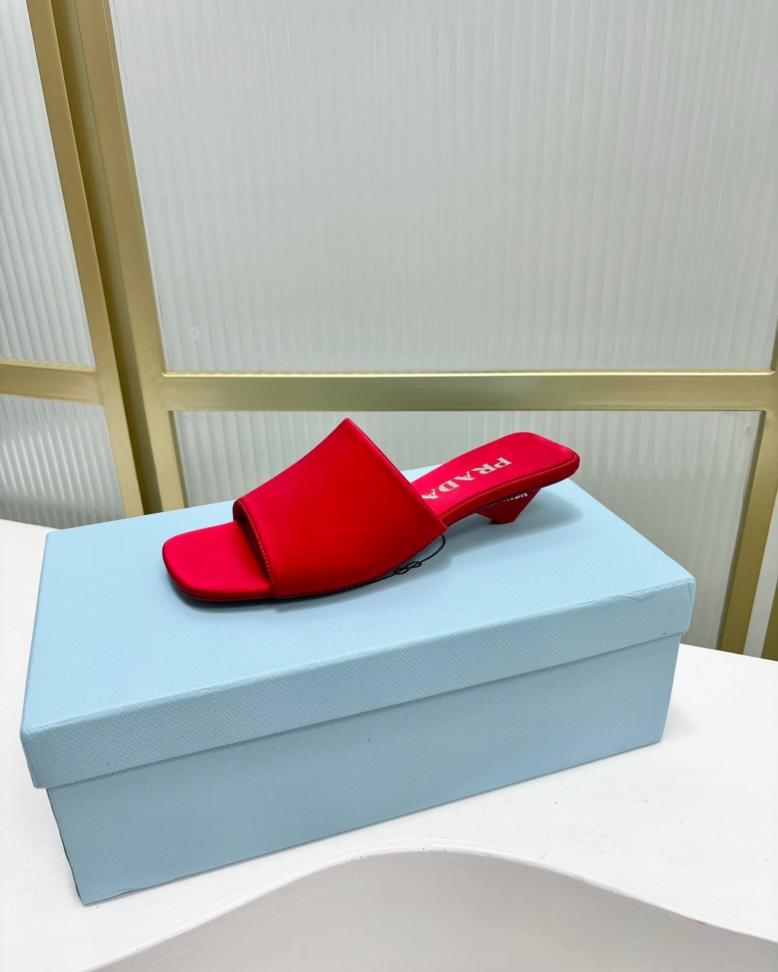 PRADA TRIANGLE HEEL SATIN SLIPPERS CRIMSON