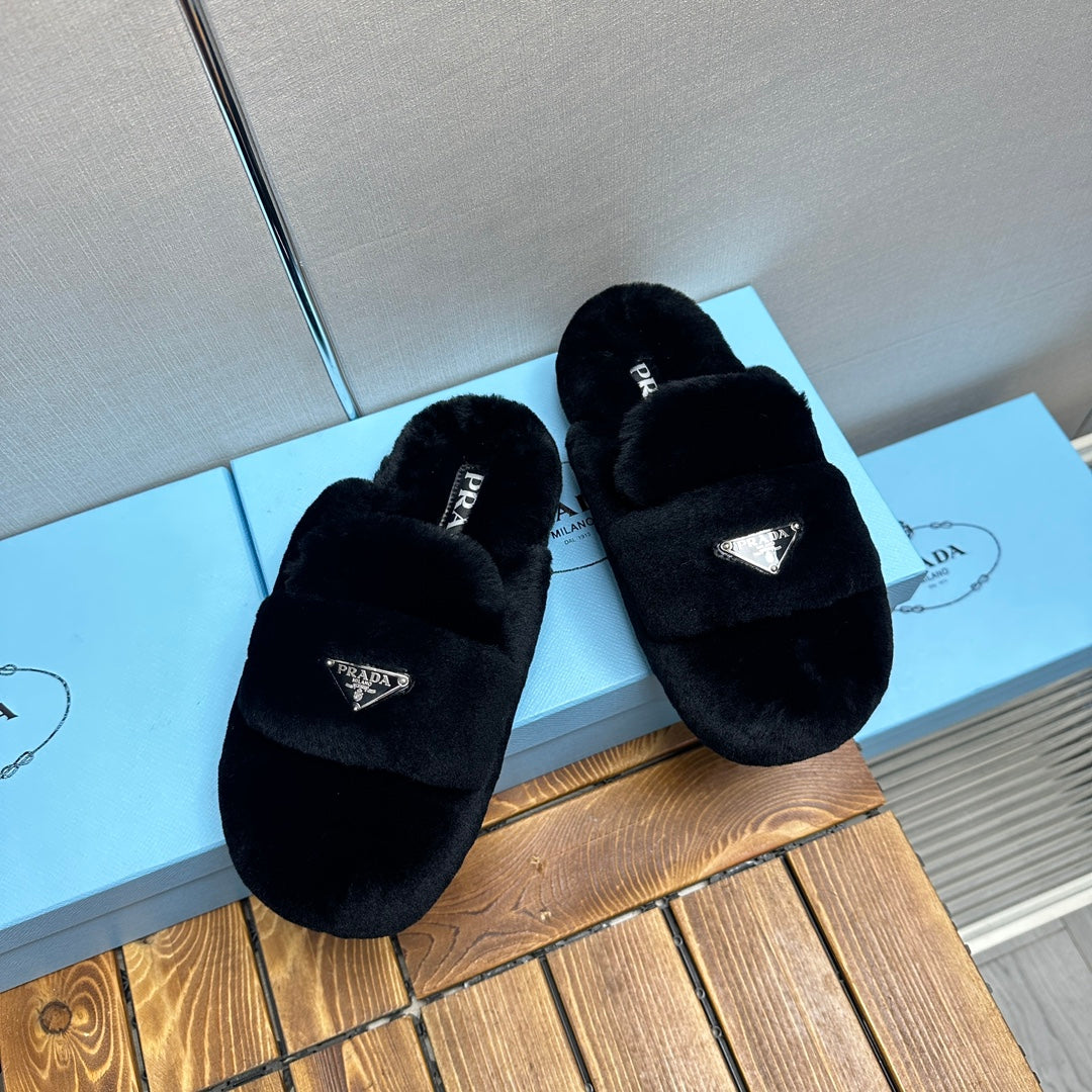 PRADA FLAT MULES IN BLACK RABBIT FUR