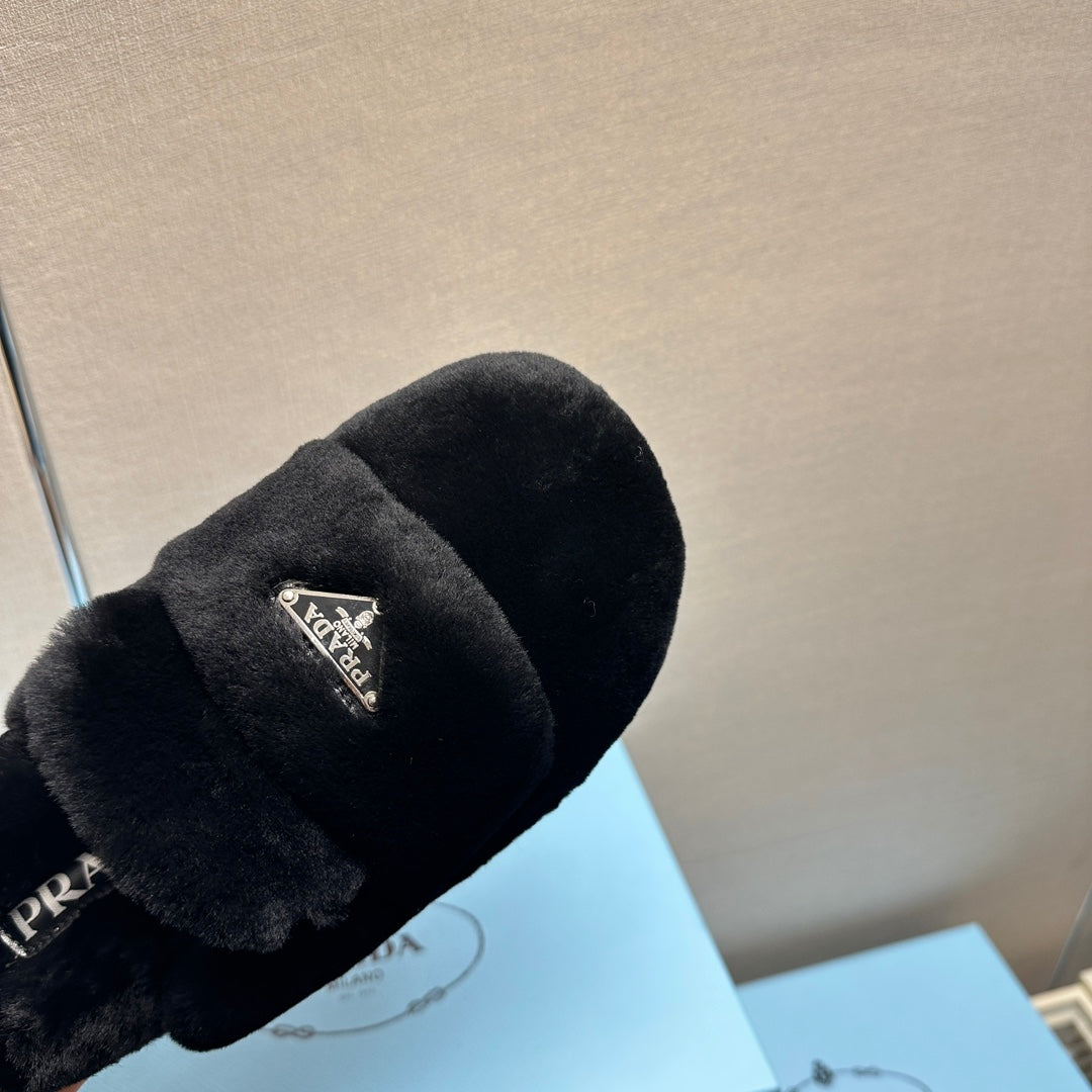 PRADA FLAT MULES IN BLACK RABBIT FUR