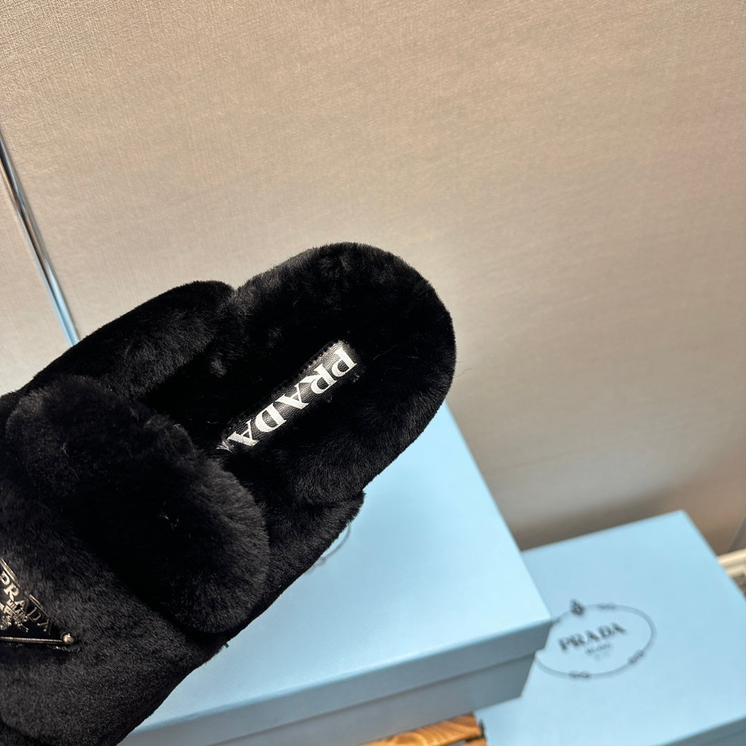 PRADA FLAT MULES IN BLACK RABBIT FUR