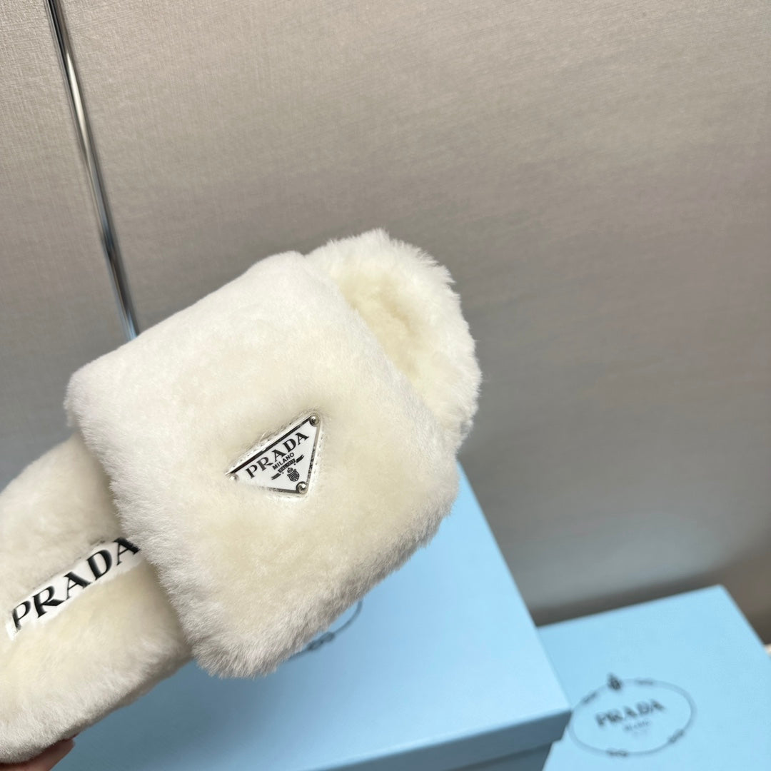 PRADA THICK-SOLED FUR SLIDES WHITE WITH TRIANGLE LOGO