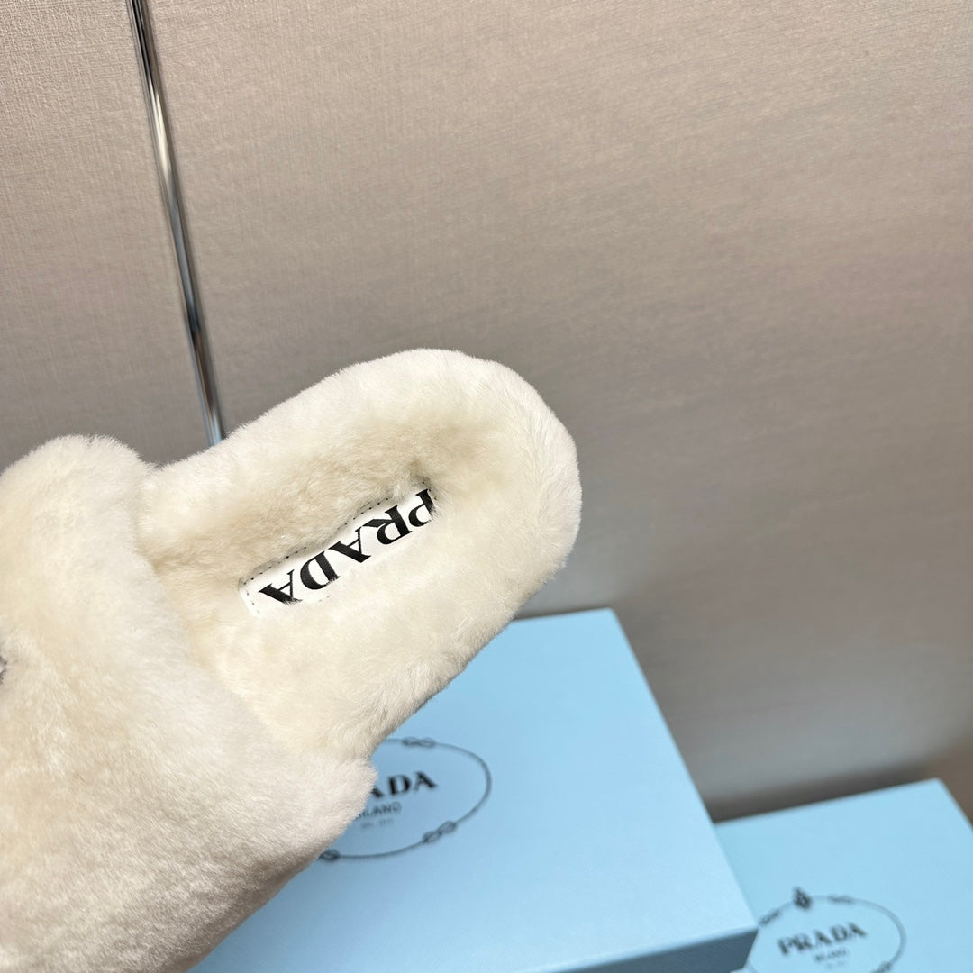 PRADA THICK-SOLED FUR SLIDES WHITE WITH TRIANGLE LOGO