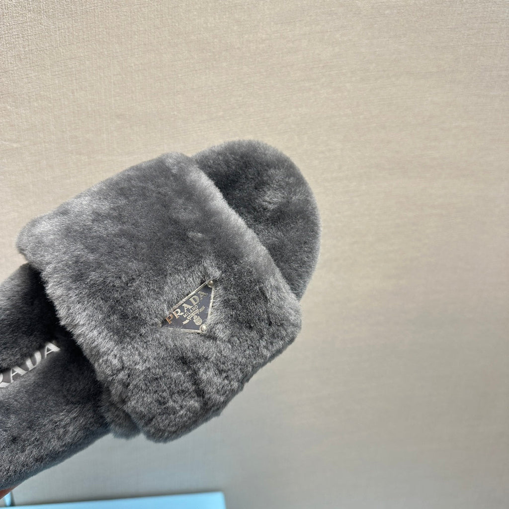 PRADA THICK-SOLED FUR SLIDES GRAY WITH TRIANGLE LOGO