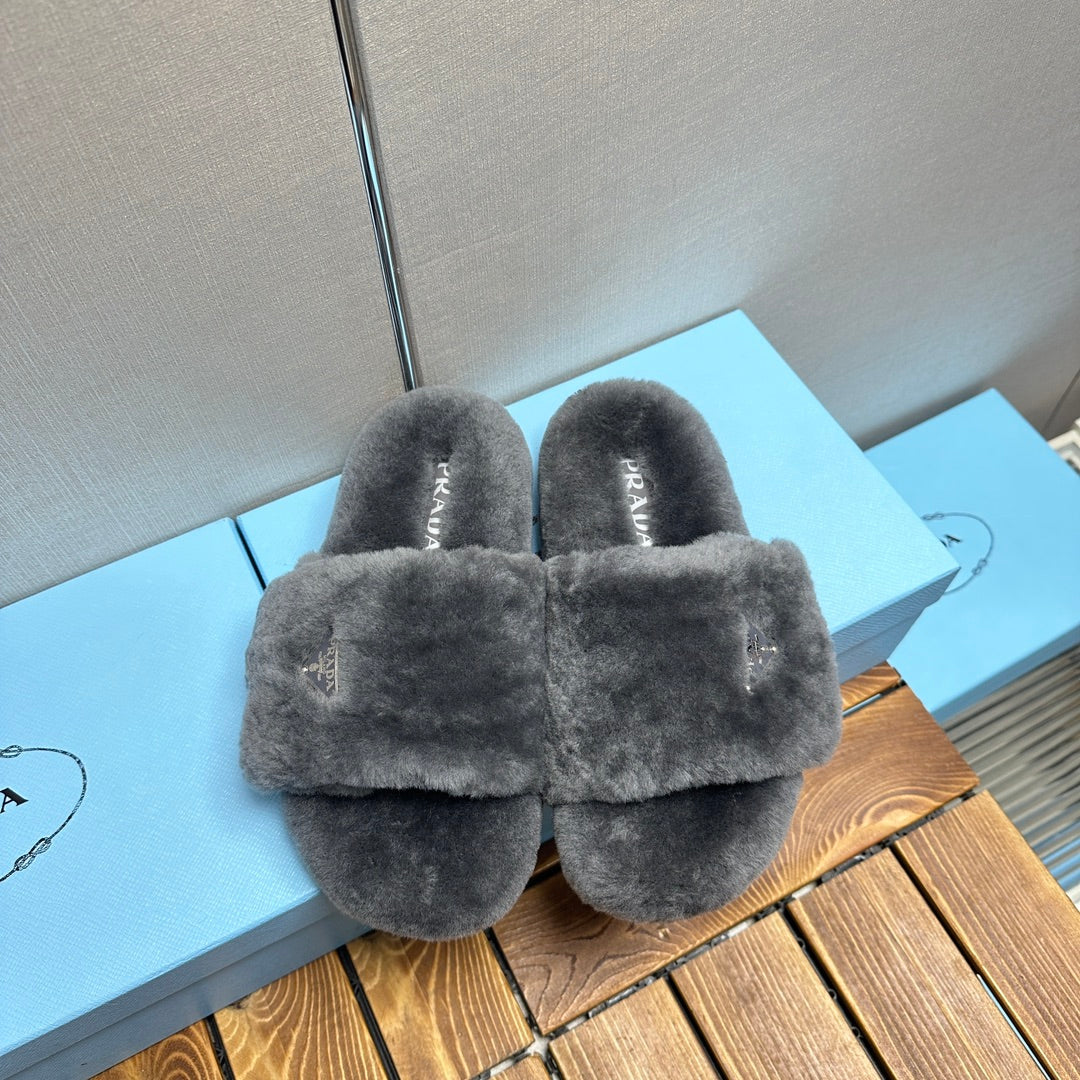 PRADA THICK-SOLED FUR SLIDES GRAY WITH TRIANGLE LOGO