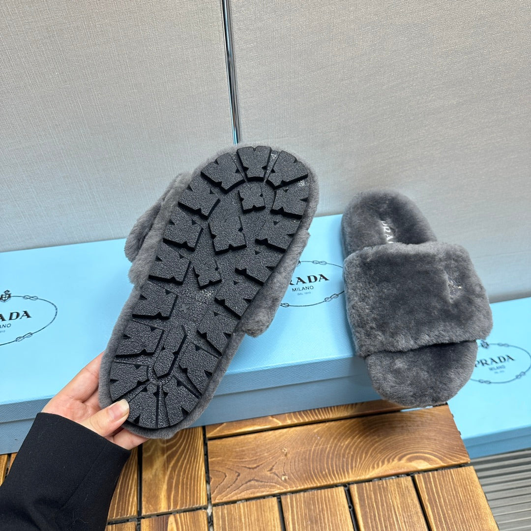 PRADA THICK-SOLED FUR SLIDES GRAY WITH TRIANGLE LOGO