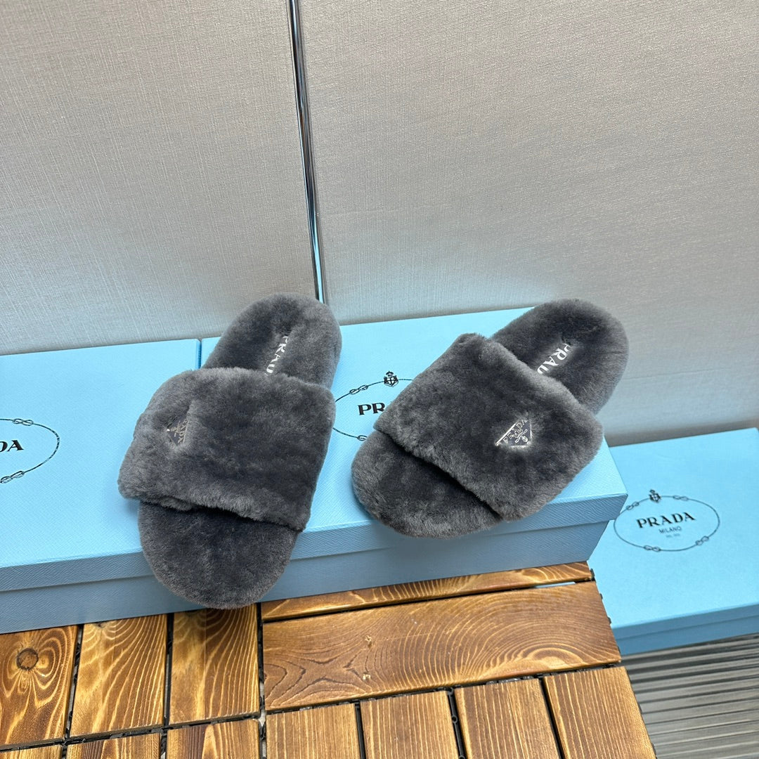 PRADA THICK-SOLED FUR SLIDES GRAY WITH TRIANGLE LOGO