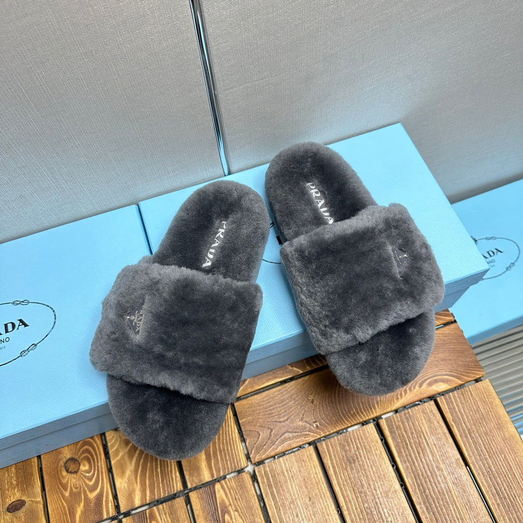 PRADA THICK-SOLED FUR SLIDES GRAY WITH TRIANGLE LOGO