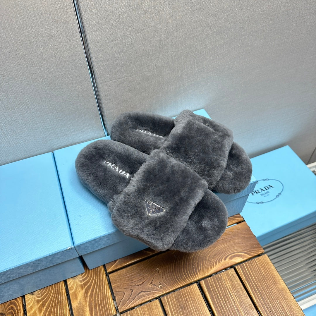 PRADA THICK-SOLED FUR SLIDES GRAY WITH TRIANGLE LOGO