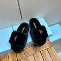 PRADA THICK-SOLED FUR SLIDES BLACK WITH TRIANGLE LOGO