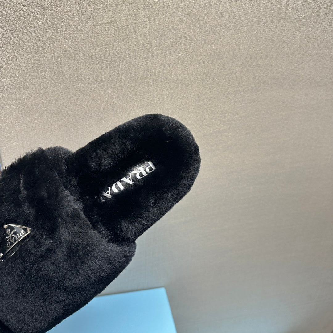 PRADA THICK-SOLED FUR SLIDES BLACK WITH TRIANGLE LOGO