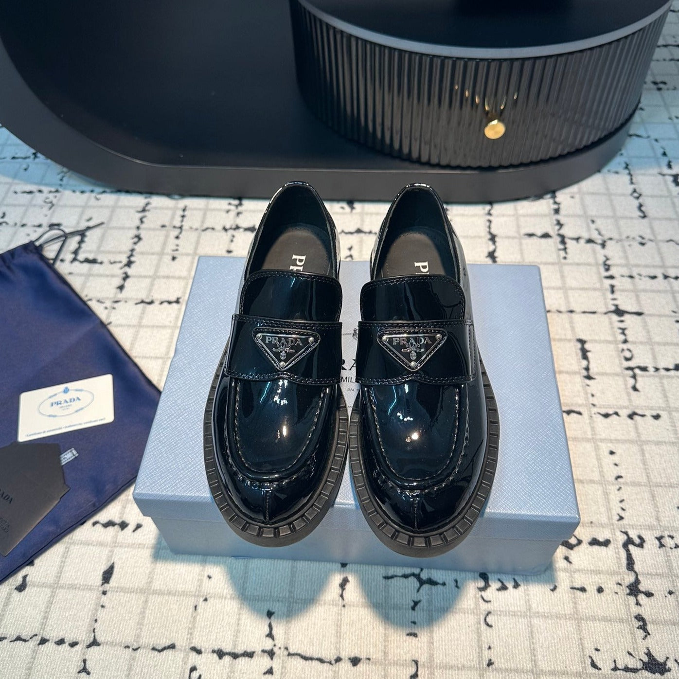 PRADA SCHOCOLATE BRUSHED LOAFERS GLOSSY BLACK CALFSKIN