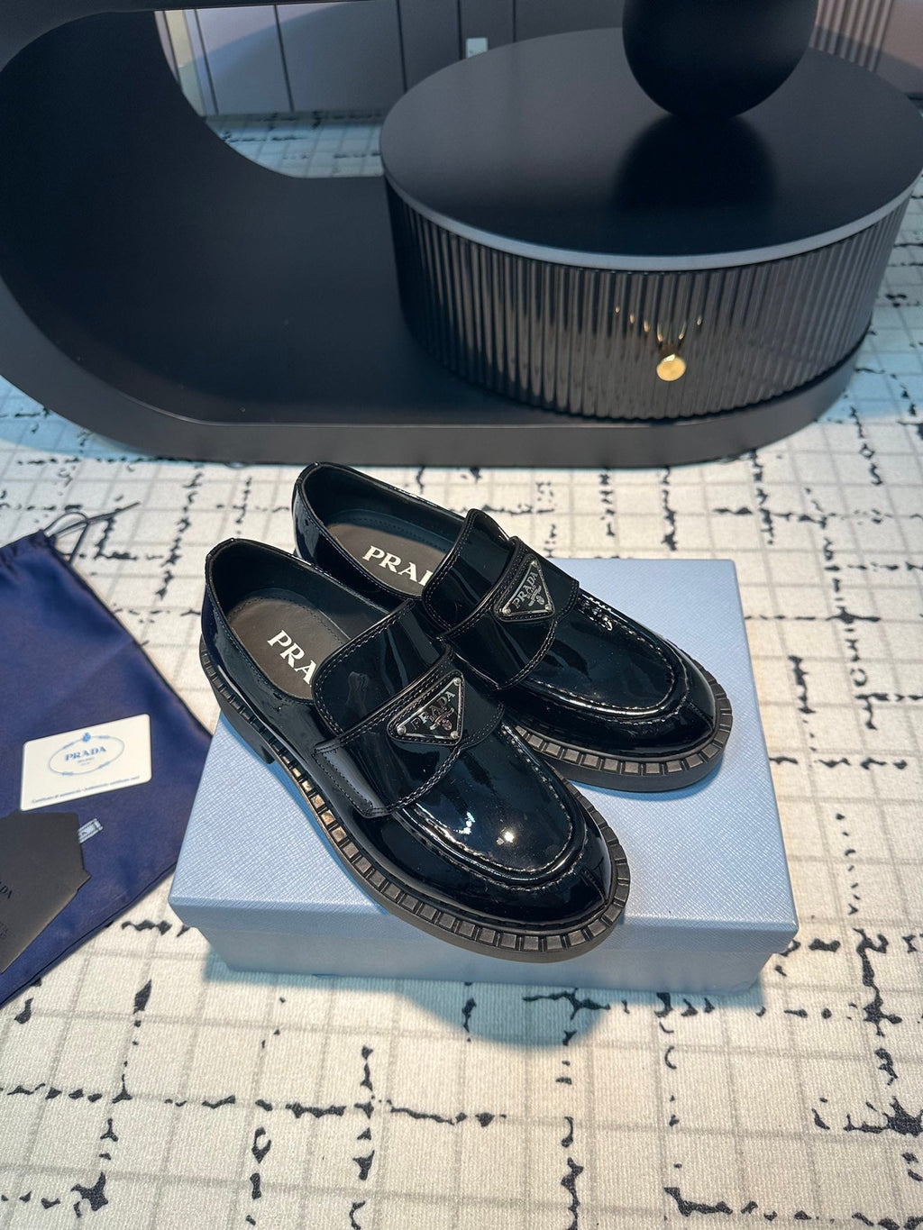 PRADA SCHOCOLATE BRUSHED LOAFERS GLOSSY BLACK CALFSKIN