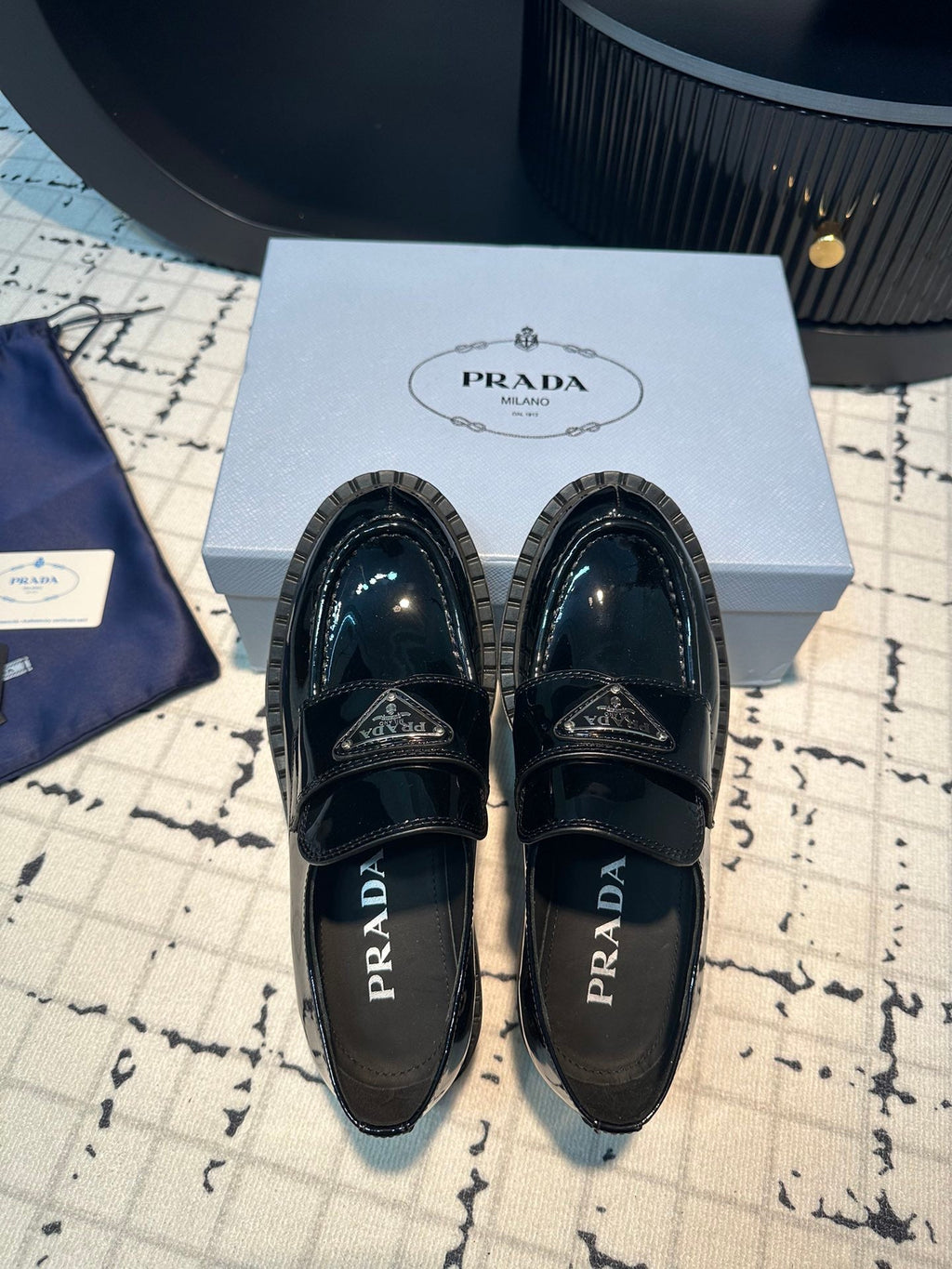PRADA SCHOCOLATE BRUSHED LOAFERS GLOSSY BLACK CALFSKIN