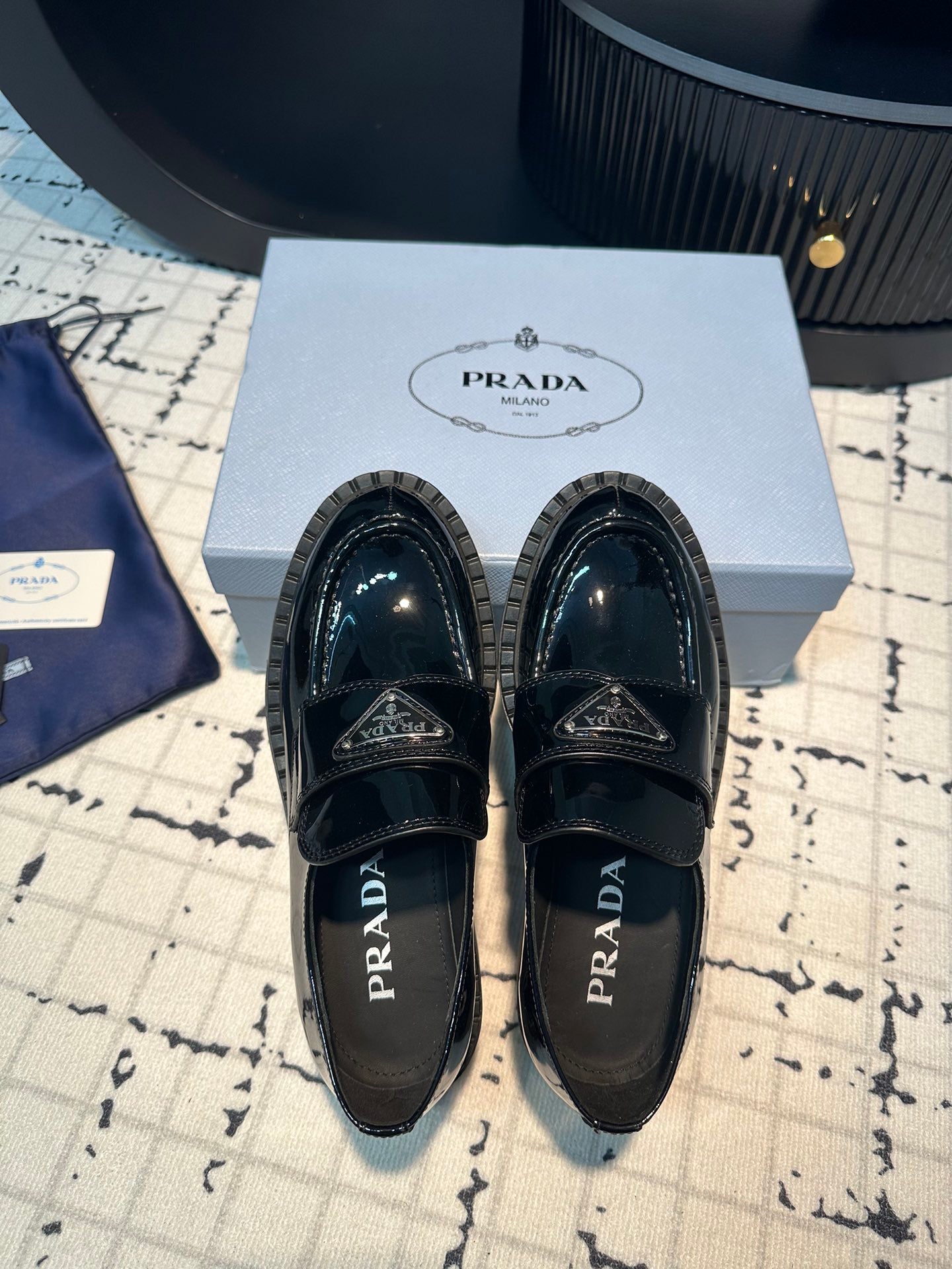 PRADA SCHOCOLATE BRUSHED LOAFERS GLOSSY BLACK CALFSKIN
