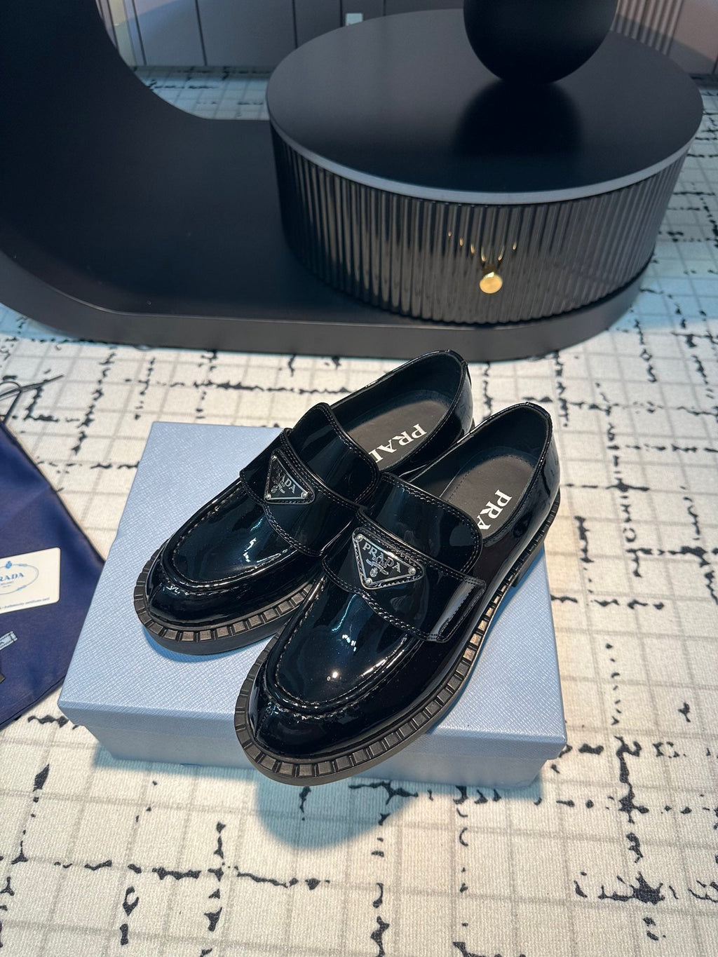 PRADA SCHOCOLATE BRUSHED LOAFERS GLOSSY BLACK CALFSKIN