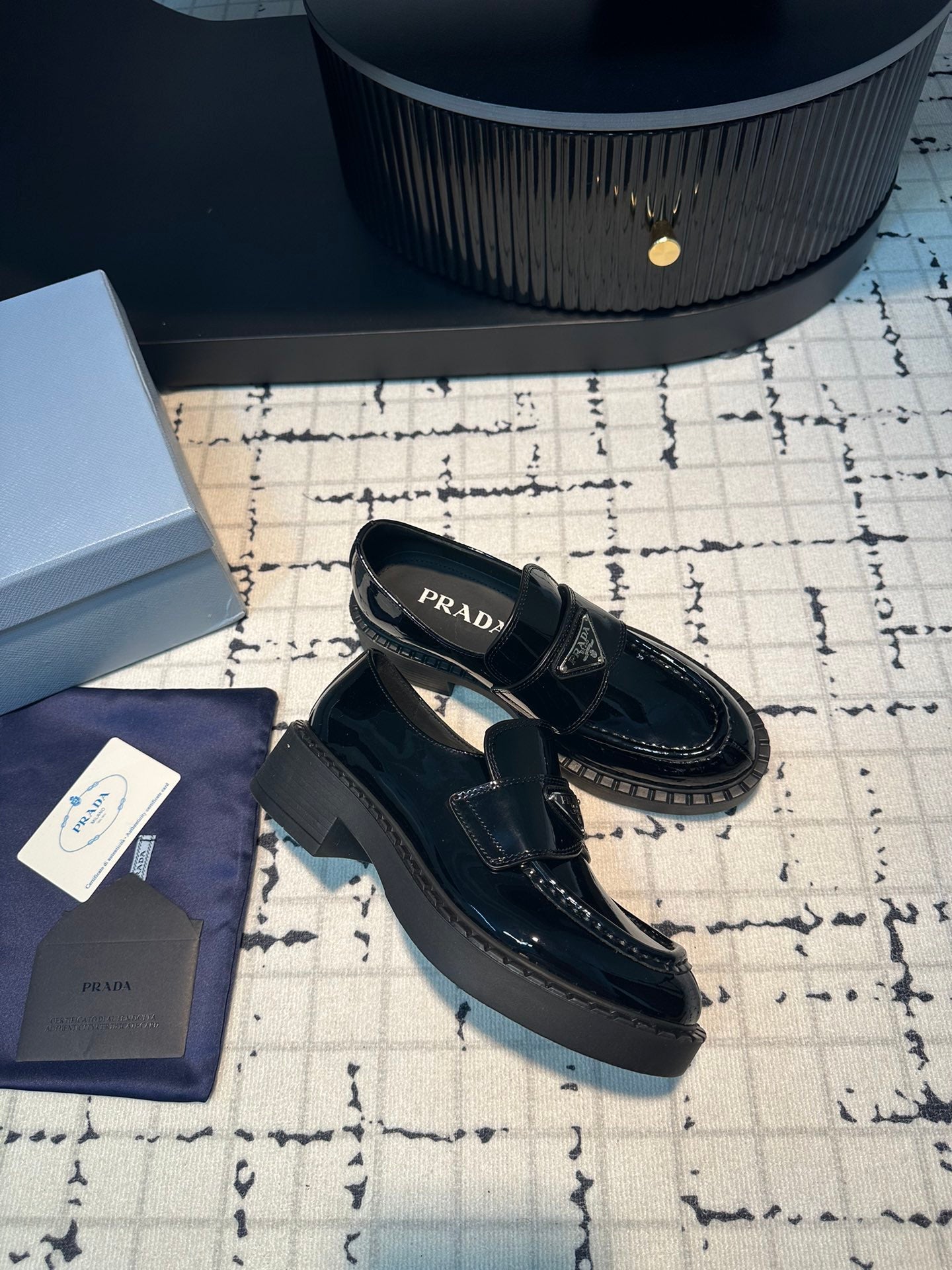PRADA SCHOCOLATE BRUSHED LOAFERS GLOSSY BLACK CALFSKIN
