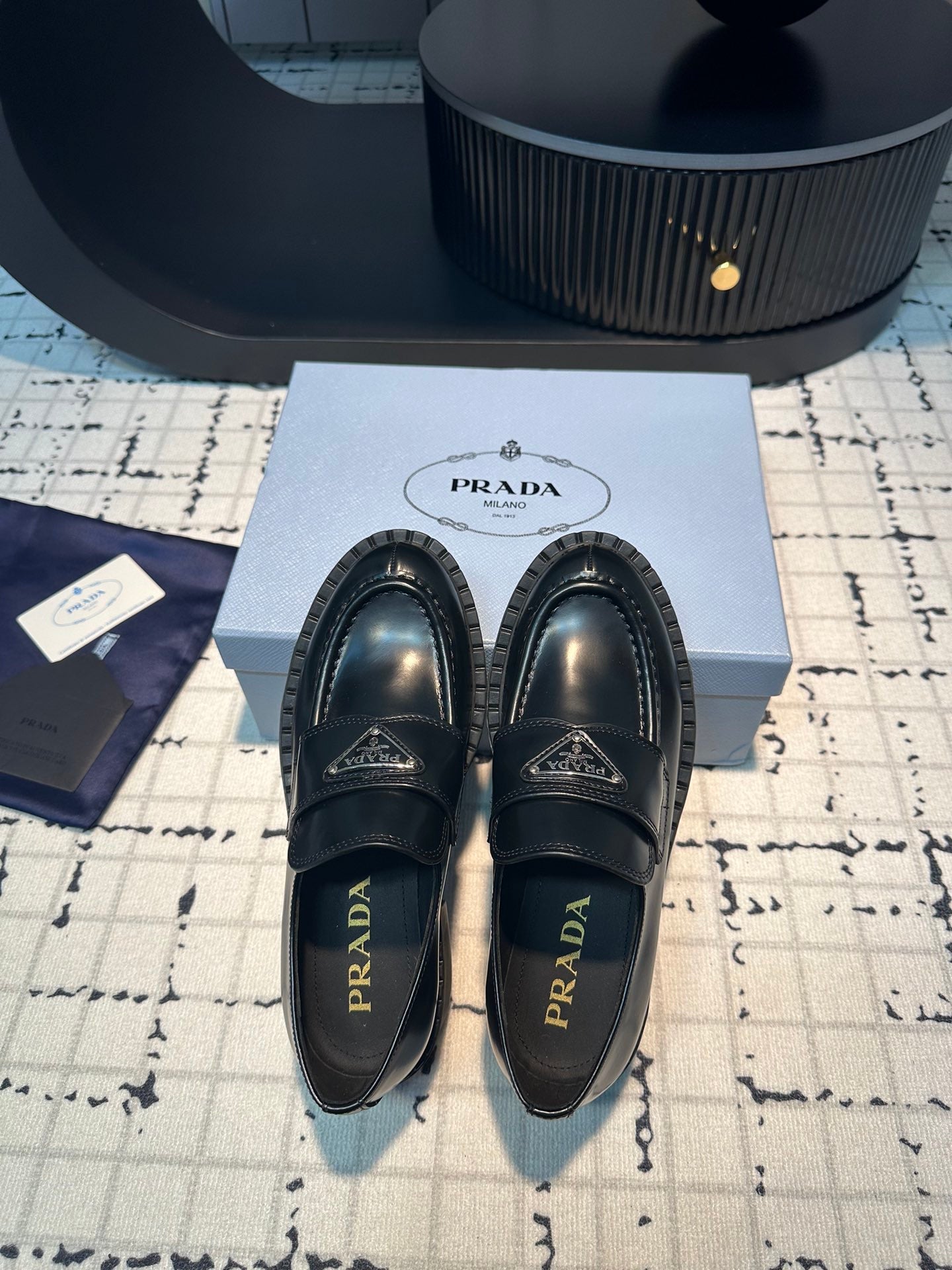 PRADA SCHOCOLATE BRUSHED LOAFERS BLACK CALFSKIN