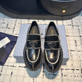 PRADA SCHOCOLATE BRUSHED LOAFERS BLACK AND WHITE BORDER CALFSKIN