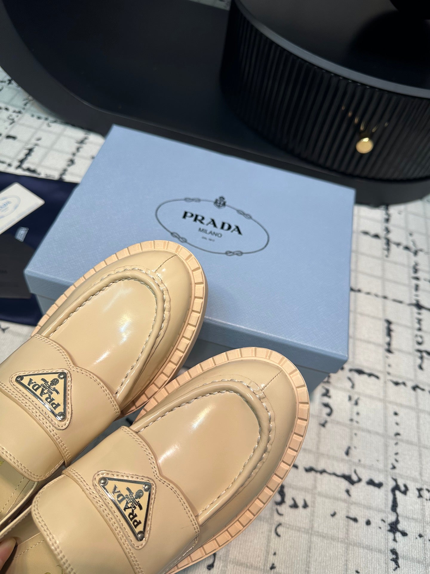 PRADA SCHOCOLATE BRUSHED LOAFERS CREAM CALFSKIN