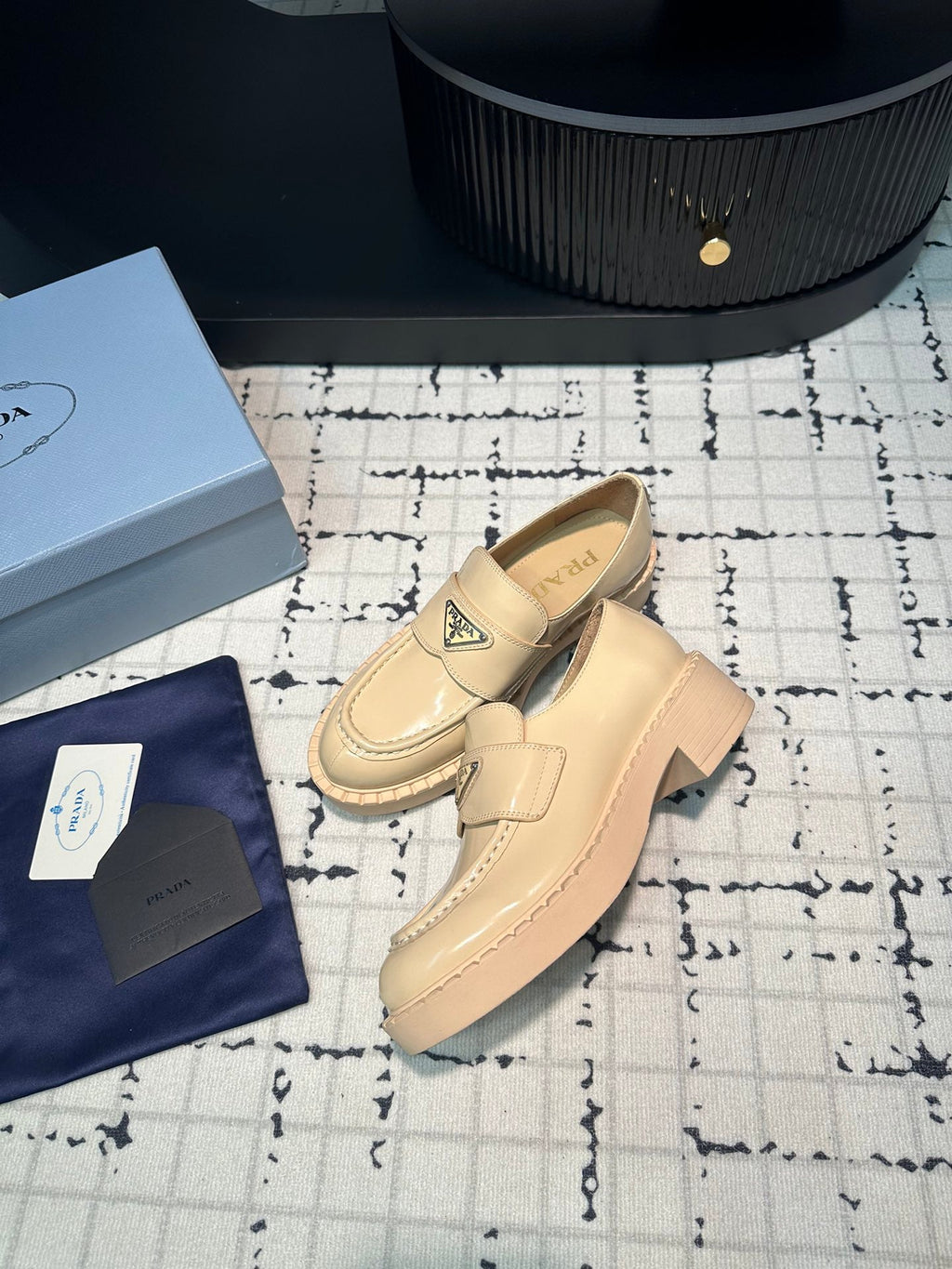 PRADA SCHOCOLATE BRUSHED LOAFERS CREAM CALFSKIN