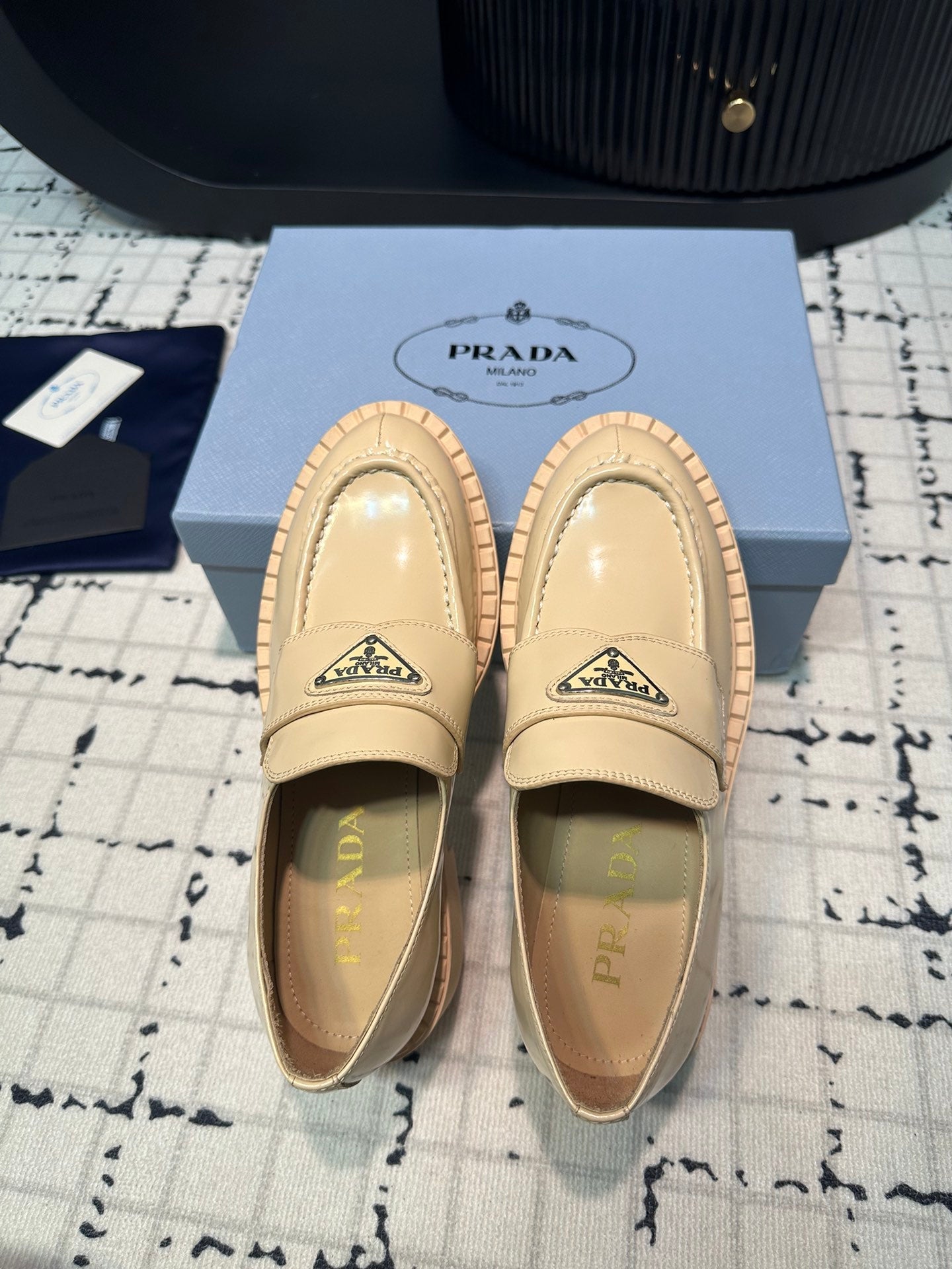 PRADA SCHOCOLATE BRUSHED LOAFERS CREAM CALFSKIN