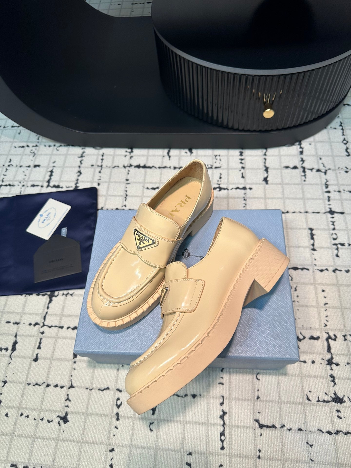 PRADA SCHOCOLATE BRUSHED LOAFERS CREAM CALFSKIN