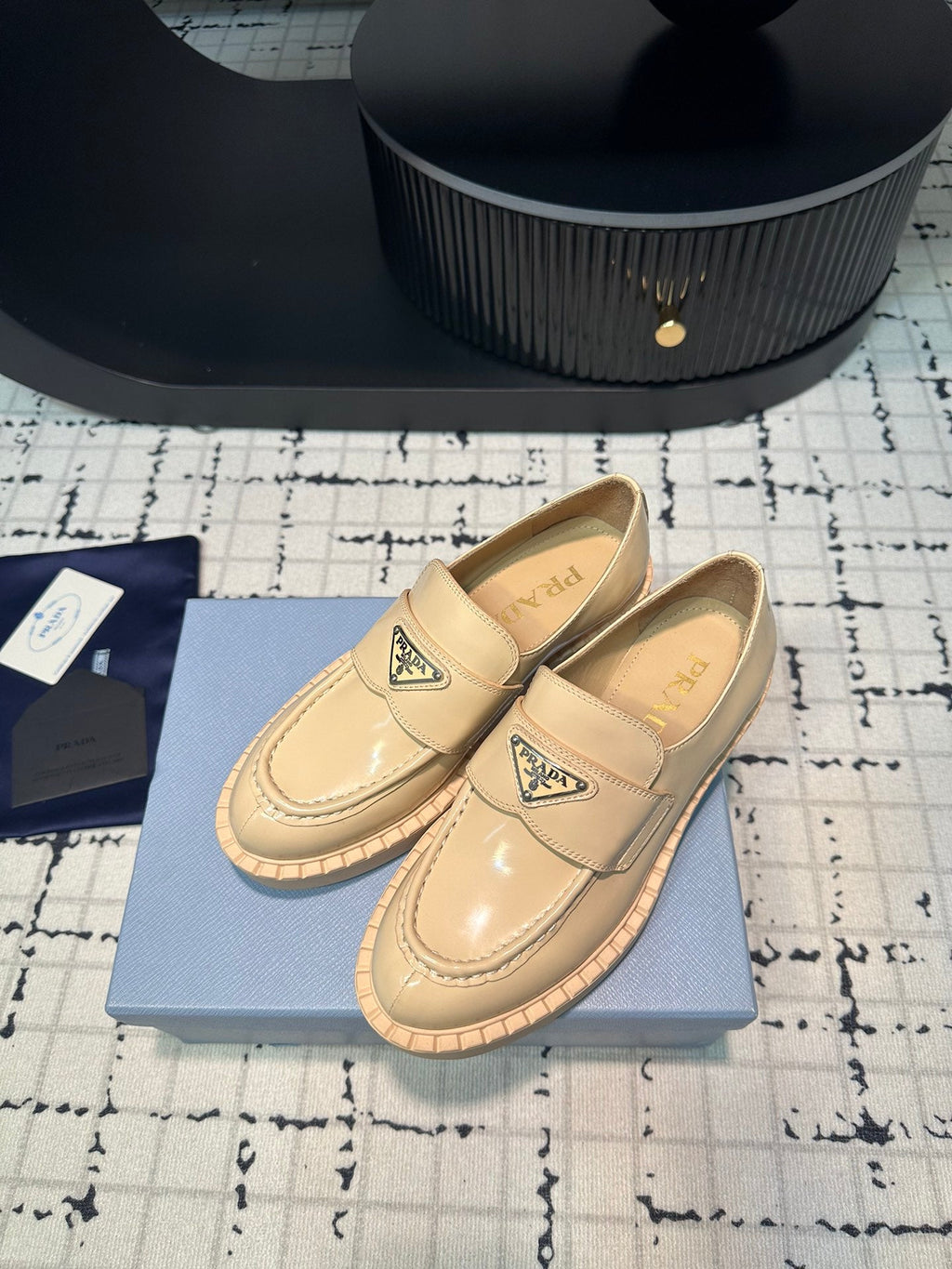 PRADA SCHOCOLATE BRUSHED LOAFERS CREAM CALFSKIN