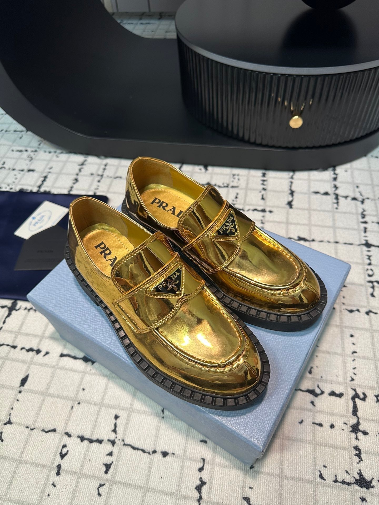 PRADA SCHOCOLATE BRUSHED LOAFERS METALLIC GOLD CALFSKIN