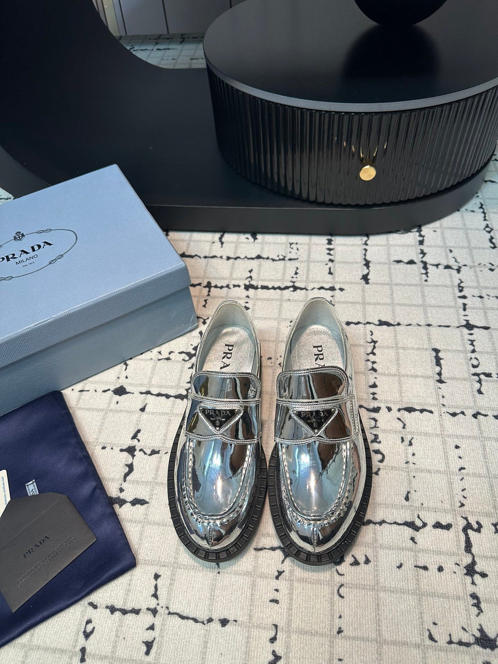 PRADA SCHOCOLATE BRUSHED LOAFERS GLOSSY SILVER CALFSKIN
