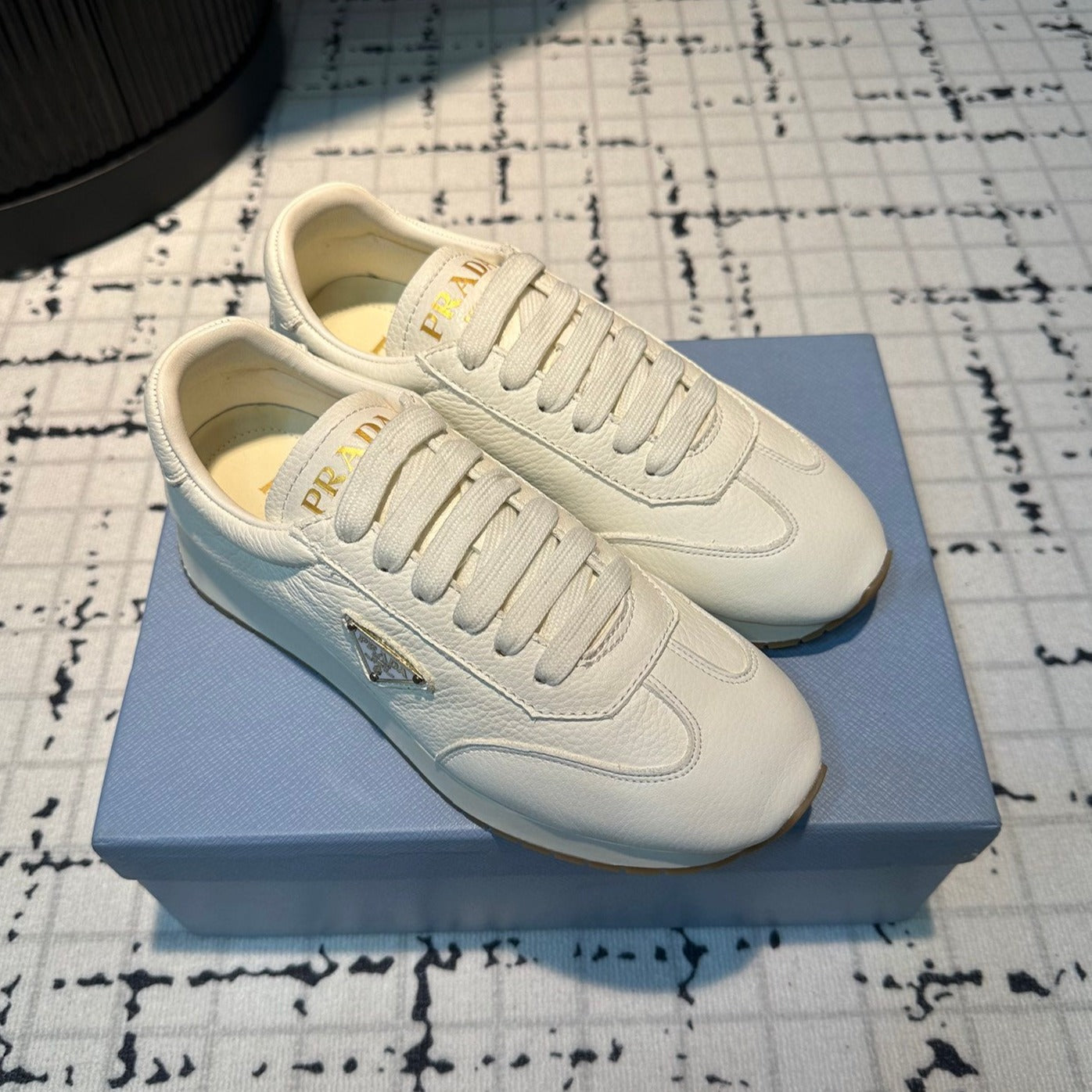 PRADA TRIANGLE LOGO SNEAKERS WHITE CALFSKIN